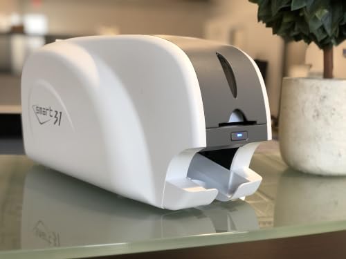 IDP SMART-31 Simplex ID Card Printer EZLoad Bundle with USB Camera, Software & Manuals. Includes a 250-print YMCKO Ribbon, 100 PVC Cards, and a Free Trial of EasyCapture Photo Software