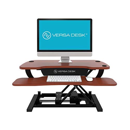 VersaDesk Power Pro USA Manufactured | Electric Height-Adjustable Desk Riser | Standing Desk Converter | Sit to Stand Desktop with Keyboard + Mouse Tray | 36" X 24" | Black Frame, Cherry Body…