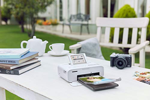 Canon SELPHY CP1300 Wireless Compact Photo Printer (White) + Canon RP-108 Color Ink Paper Set (108 Sheets of 4 x 6 Paper) + NeeGo Printer Cable + NeeGo Print Protector (100 Pack)