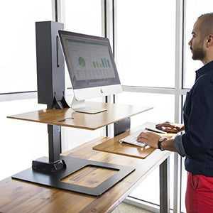 UPLIFTDESK E7 Electric Standing Desk Converter - Black Base, Natural Rubberwood Worksurface (Triple Monitor)