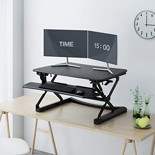 FlexiSpot M2B Standing Desk Converter - 35 Inch wide platform Height Adjustable Stand up Desk Riser with Removable Keyboard Tray (Medium size Black)