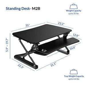 FlexiSpot M2B Standing Desk Converter - 35 Inch wide platform Height Adjustable Stand up Desk Riser with Removable Keyboard Tray (Medium size Black)