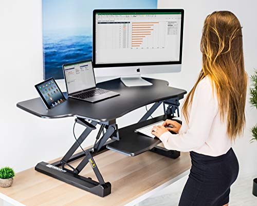 Mount-It! Height Adjustable Standing Desk Converter | 48” Wide Tabletop Sit Stand Desk Riser with Gas Spring | Stand Up Computer Workstation Fits Dual Monitors | Black | MI-7925