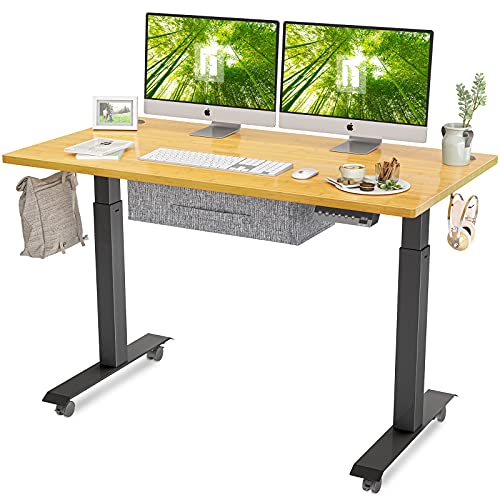 FEZIBO Electric Height Adjustable Standing Desk with Drawer, 48 x 24 Inches Splice Board, Black Frame/Bamboo Top