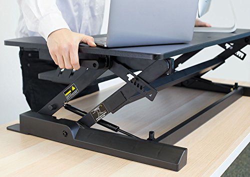 Mount-It! Standing Desk Converter - Height Adjustable Stand Up Desk with Gas Spring Riser - Wide 36 Inch Sit Stand Workstation Fits Dual Monitors – Black (MI-7926)