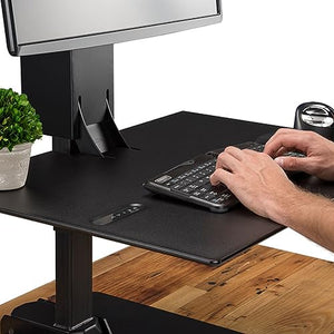 UPLIFTDESK E7 Electric Standing Desk Converter - Black Base, Natural Rubberwood Worksurface (Triple Monitor)