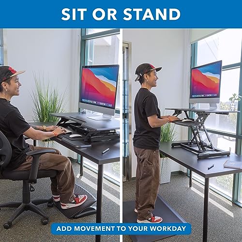 Mount-It! Electric Standing Desk Converter with 38" Tabletop, Height Adjustable Sit Stand Desk Riser, Motorized, Keyboard Tray, Device Slot - Black