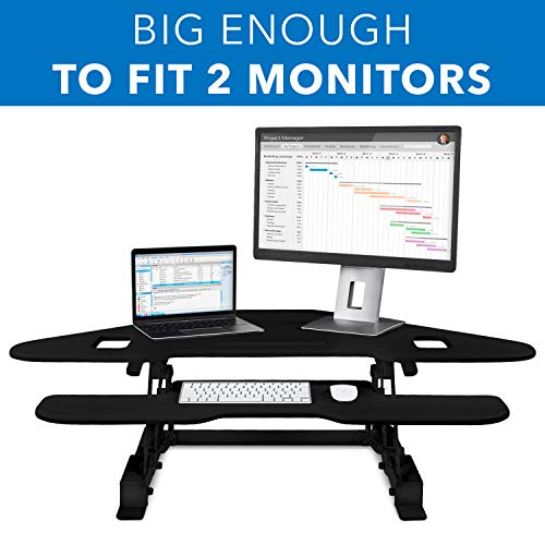 Mount-It! Corner Standing Desk Converter | Height Adjustable 48” Wide Desktop | Corner Stand Up Desk with Gas Spring Handle | Stand Up Computer Workstation with Ergonomic Keyboard Tray | Black